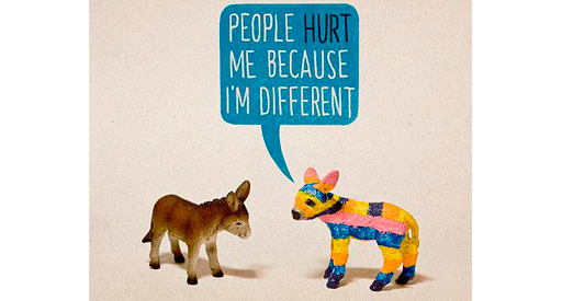 A brown dear and a multicolored deer with text "People hurt me because I'm different."