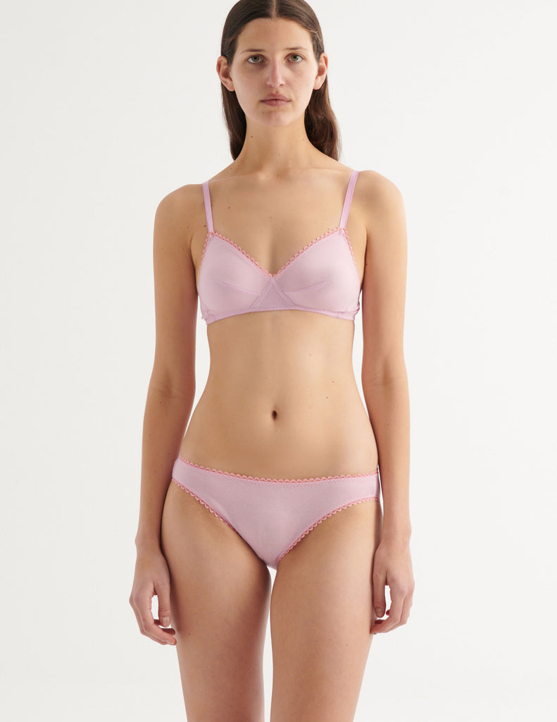 an image of a model in the antonia bralette and stella thong in slipper pink