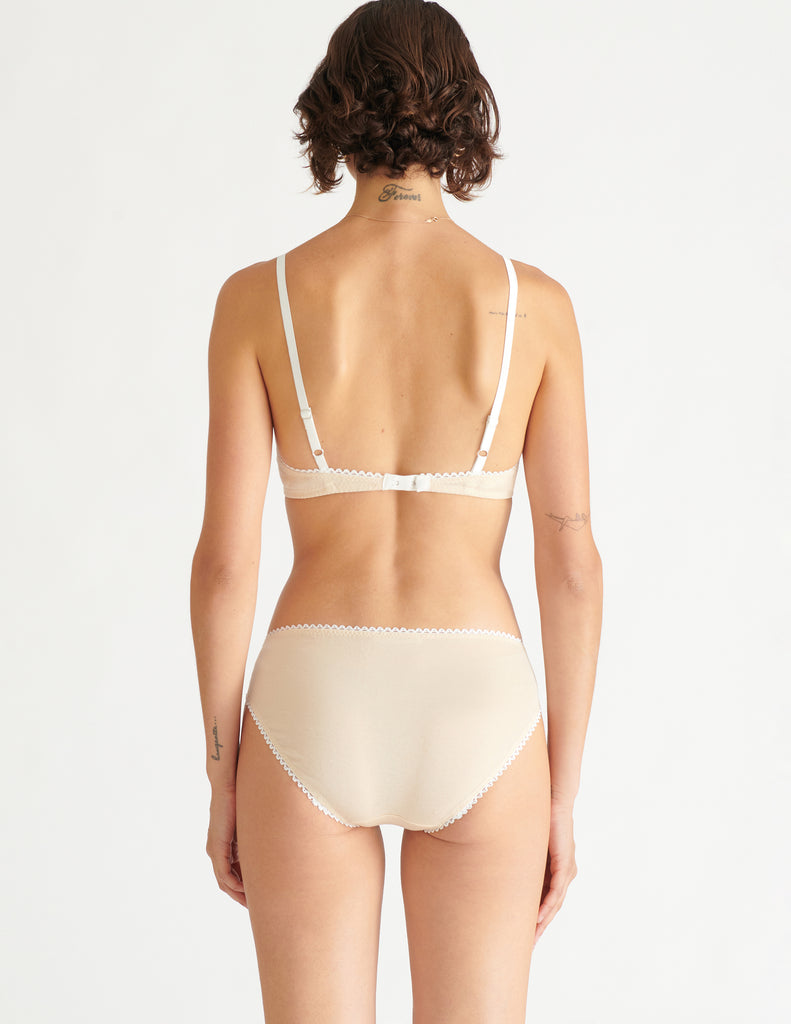 back of woman in undyed antonia cotton bra