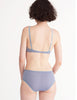 a model from the back in the josephine panty and antonia bralette in feather grey