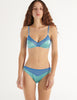 woman in blue silk Beatrice Bralette and Aaron Panty