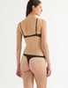 from the back of a model in the beatrice bralette and maya thong in walnut brown