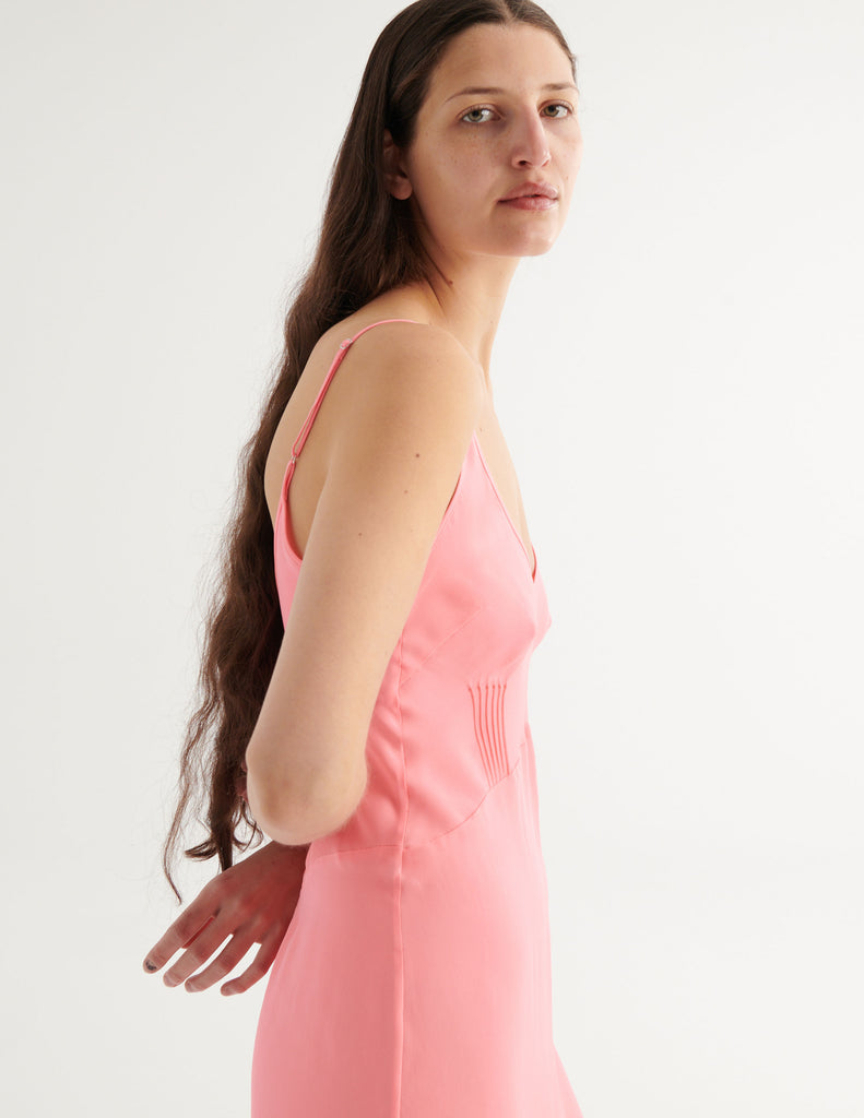 from the side a model in the cadel slip in prima pink