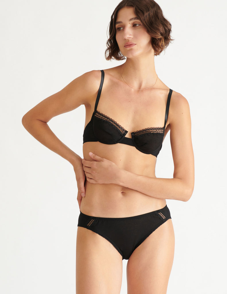 a model in the chloe underwire bra and sonja panty in black