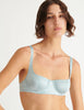 a model in the gita underwire bra in nimbus blue