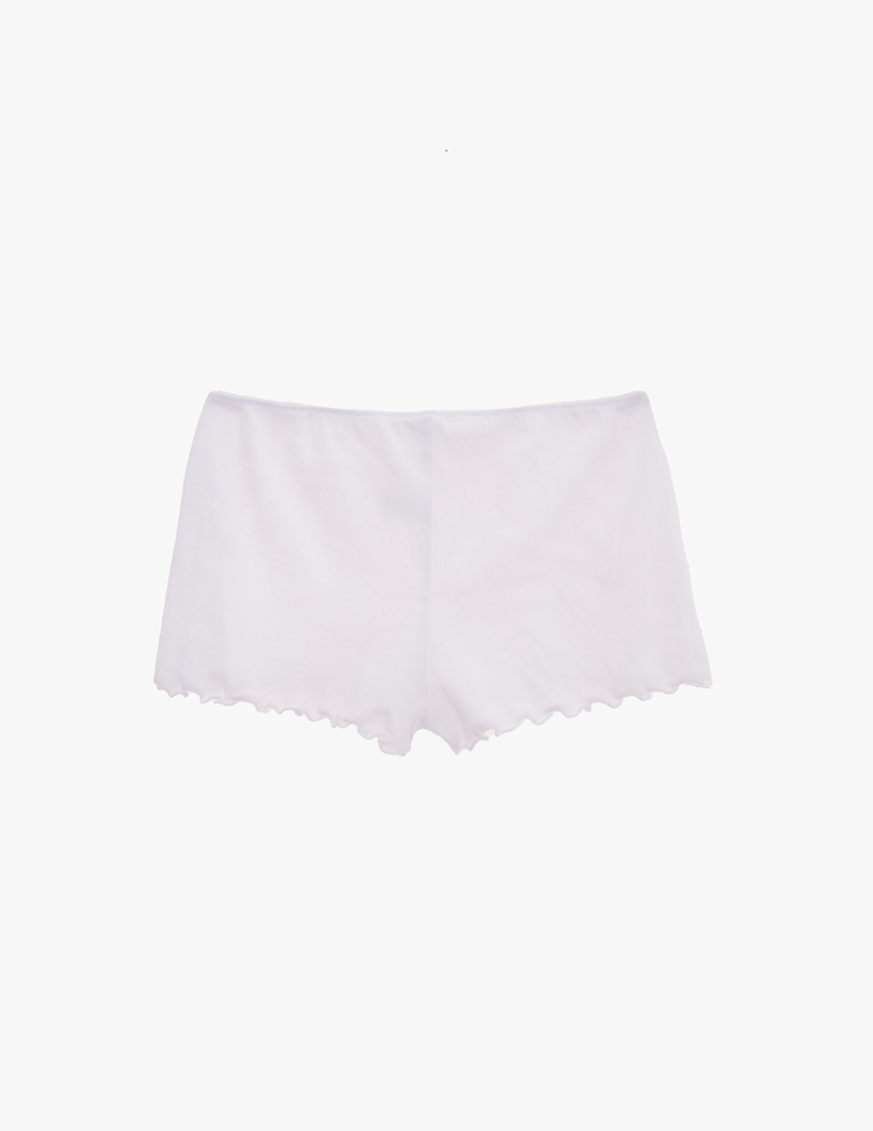 a flat lay of the kat short scalloped white short