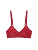 a flat lay of the tamara bralette in cardinal red