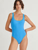 a model in the luna one piece in iris