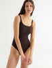 a model wearing natalie one piece in walnut