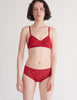 a model in the tamara bralette and imogen hipster in cardinal red