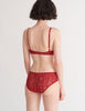 a model in the tamara bralette and imogen hipster in cardinal red