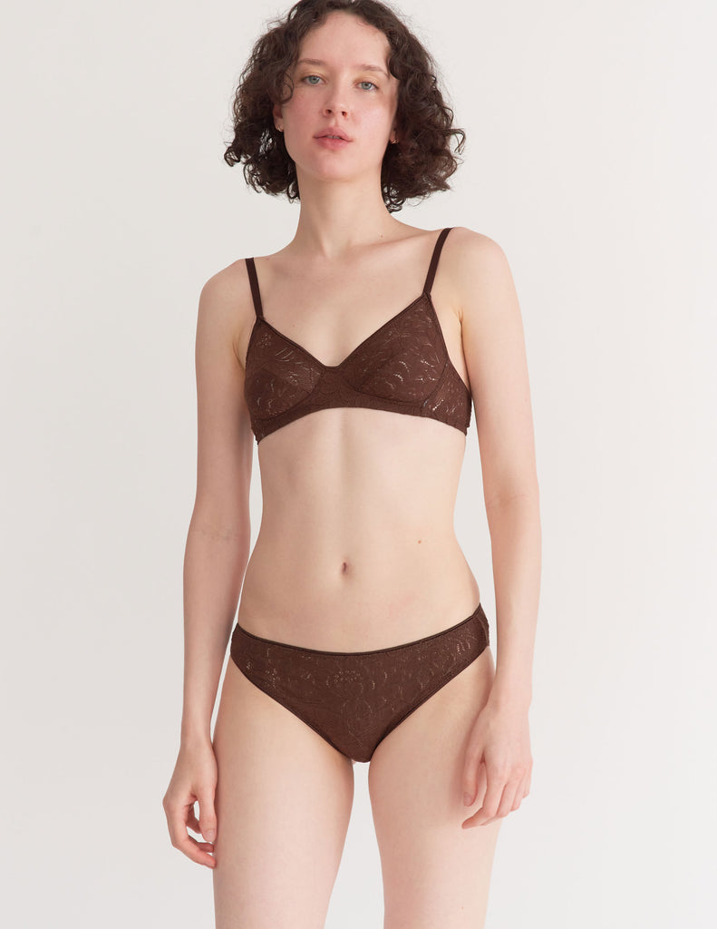 a model in the tamara bralette and tris panty in carob brown