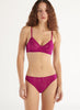 a model in the tamara bralette and tris panty in sorbet purple