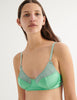 woman in green cotton and silk Willow Bralette