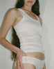 a model wearing the james tank top in white cotton