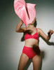 woman wearing pink cotton bralette and layered panties by Araks