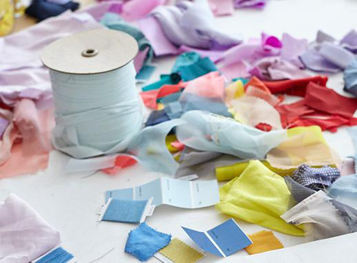 Closeup photo of colorful fabric swatches on a table